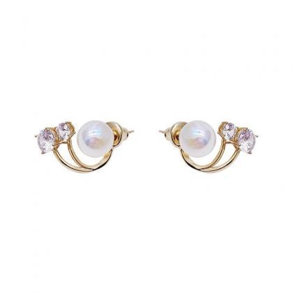 Exquisite Fashion Inlaid Pearl Color Earrings..